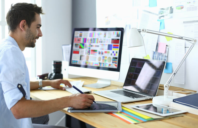 Harness the Power of Internet Marketing: Proven Techniques & Strategies WEB DESIGNER WORKING ON A PROJECT