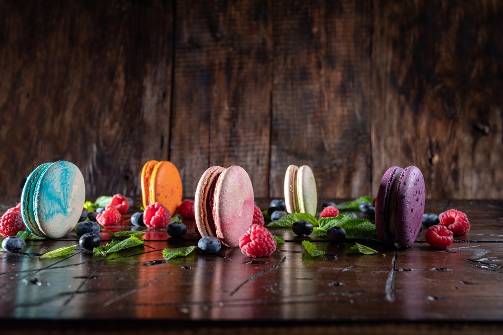 A PHOTO OF MULTIPLE COLORED MACAROONS ARRANGED IN A PATTERN TO REPRESENT THE VARIOUS COLORS USED IN WEB DESIGN.